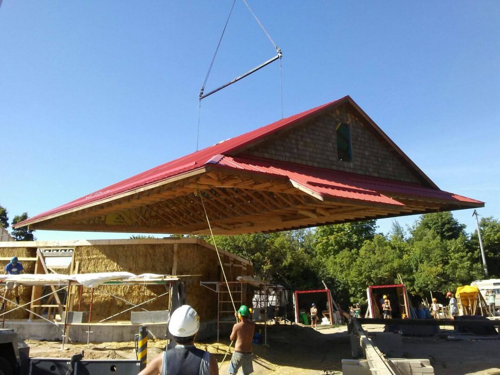 Craning a roof into place